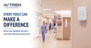 AVTRON voice evacuation system speaker for clear emergency announcements in a hospital corridor.